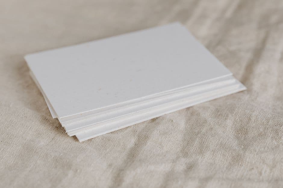 Blank paper stack texture behind the ledge charge stack